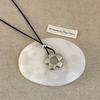 Delicate Long Leather Cord Necklace with Intricate Flower Charm Ideal for Fashion Forward Women Seeking Unique Accessories