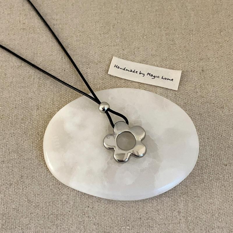 Delicate Long Leather Cord Necklace with Intricate Flower Charm Ideal for Fashion Forward Women Seeking Unique Accessories