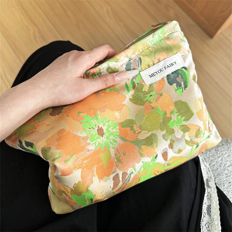 "Compact Fresh Cosmetic & Skincare Travel Bag - Portable Handheld Storage for Toiletries & Underwear"