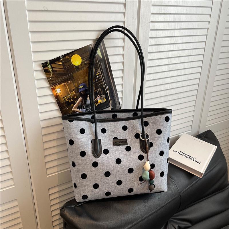 Stylish Polka Dot Large Capacity Tote: Versatile, Fashionable Handheld & Shoulder Bag for Commuting.