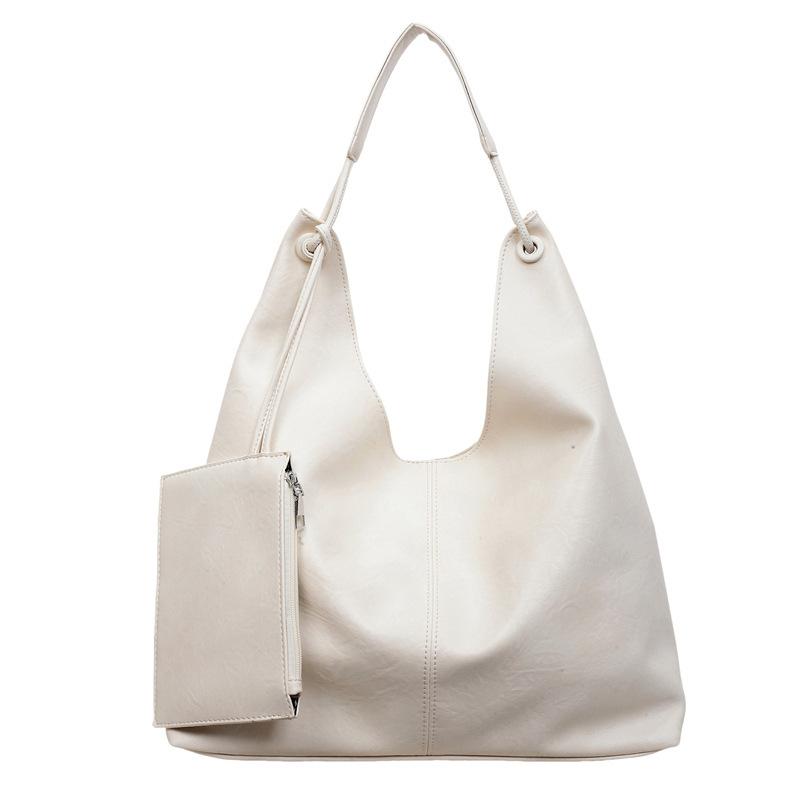 Large Capacity Tote Bag Women's 2026 Spring New Fashion Retro Sense Light Luxury Shoulder Armpit Bag