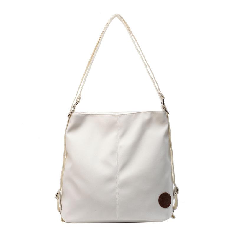 

Женские сумки ручной работы — это модные и простые сумки большой вместимости, сумки через плечо, сумки для поездок на работу. белый