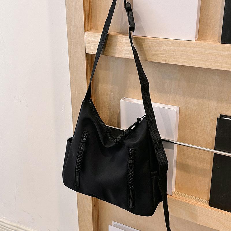 Fashion and leisure large-capacity bags Women's spring and summer new canvas bags Students commute to class Versatile oblique