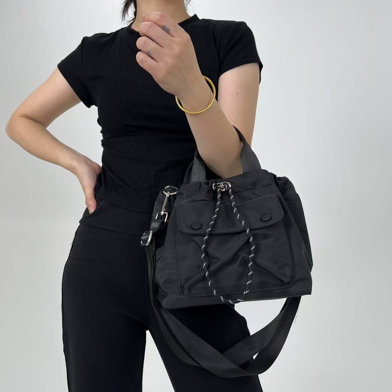 Ladies  Fashionable and Lightweight Oxford Cloth Casual Handbag with Drawstring Front Pocket and Simple Shoulder Bag