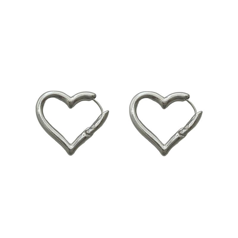 

Female Temperament Cold Style Versatile Hollow Heart Earrings срібний