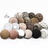 Metal Tack Buttons for Denim Jackets, Overalls, and Clothing - Men's, Women's, and Children's Apparel.