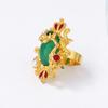 Une bague ouverte rétro, exquise, individualiste, tendance, de style ethnique en alliage incrusté de résine vert émeraude avec des fleurs