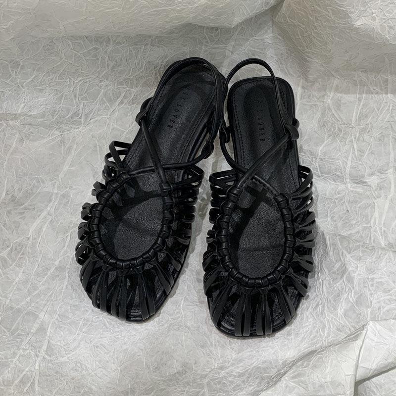Baotou Roman sandals women's summer 2025 summer new French woven flat-bottomed pig cage shoes fairy strap soft sole