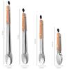Beechwood-Handled Stainless Steel Food Tongs for Grilling and Serving Steak, Bread, and Cooked Meats.