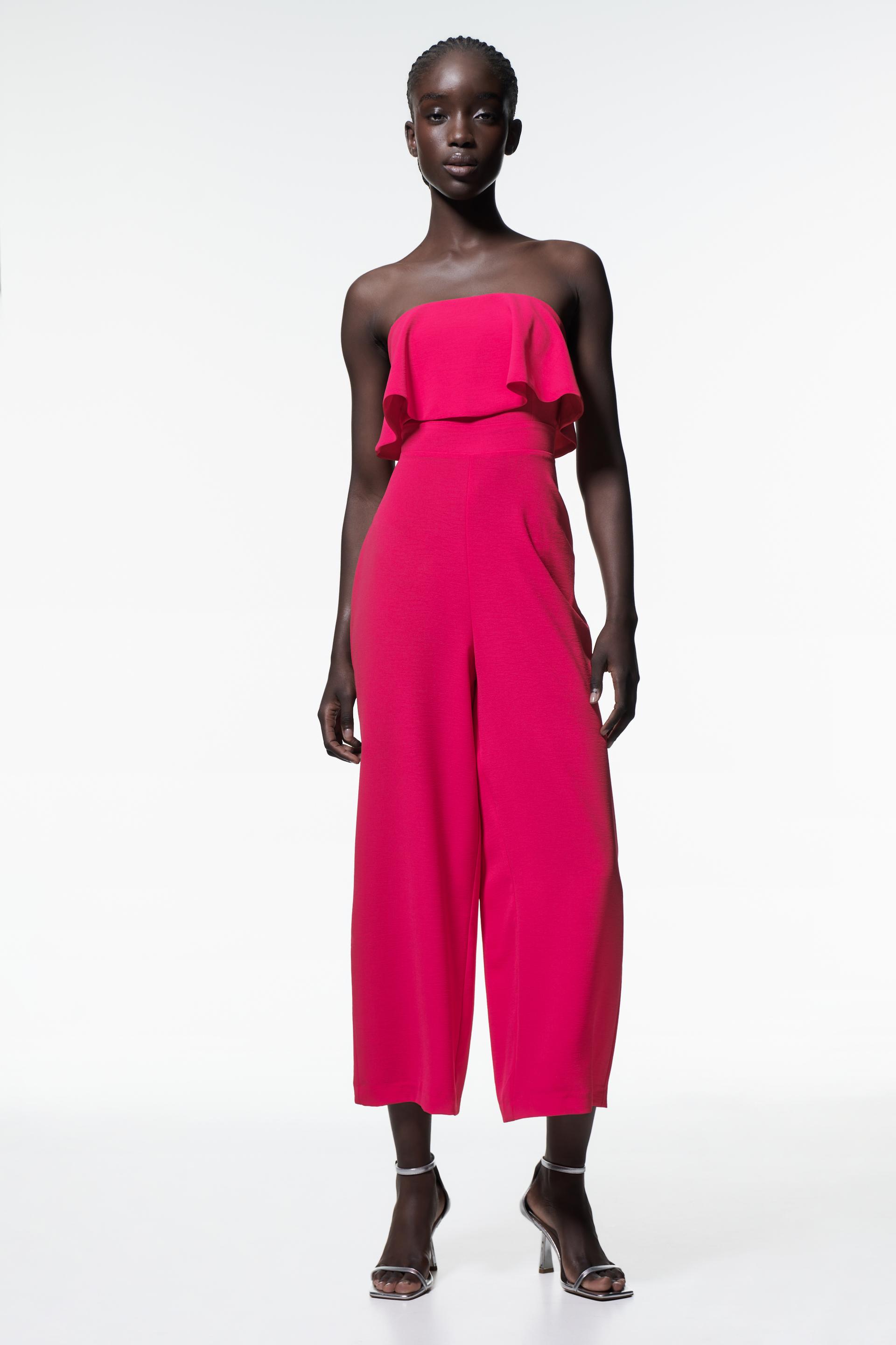 

STRAIGHT NECK JUMPSUIT WITH LAYERED DETAIL
