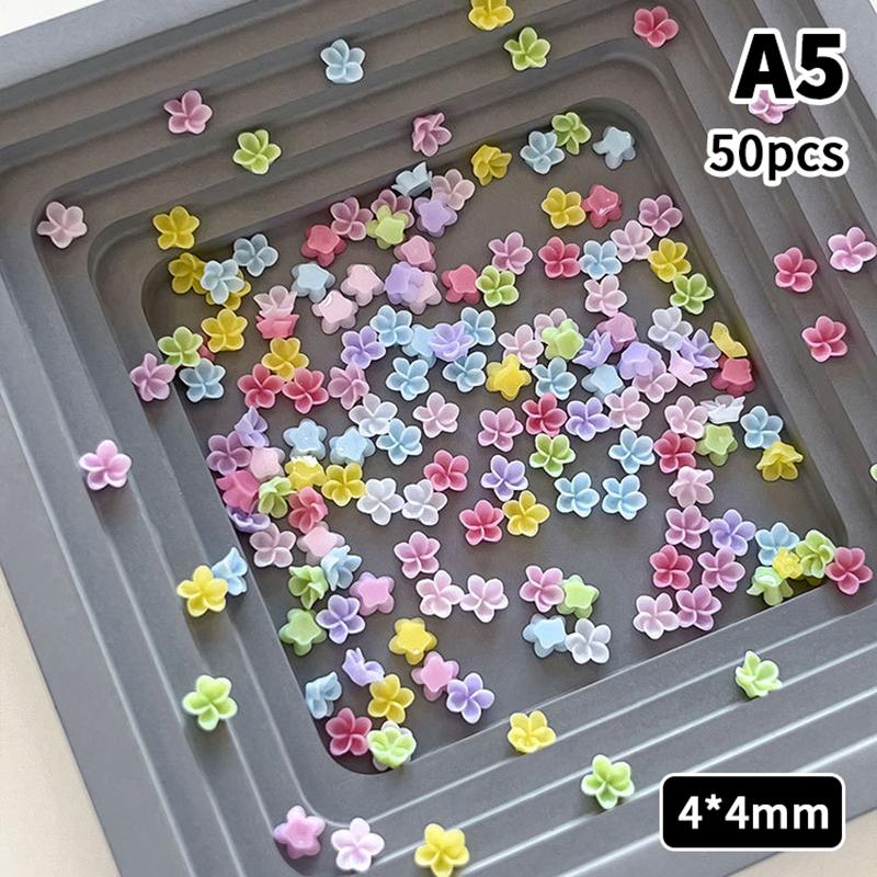 

50 шт. Разноцветные Шармы-Цветы Франжипани для Ногтей 3D Пятилепестковый Цветочный Декор для DIY Накладных Ногтей Украшения для Маникюра A5