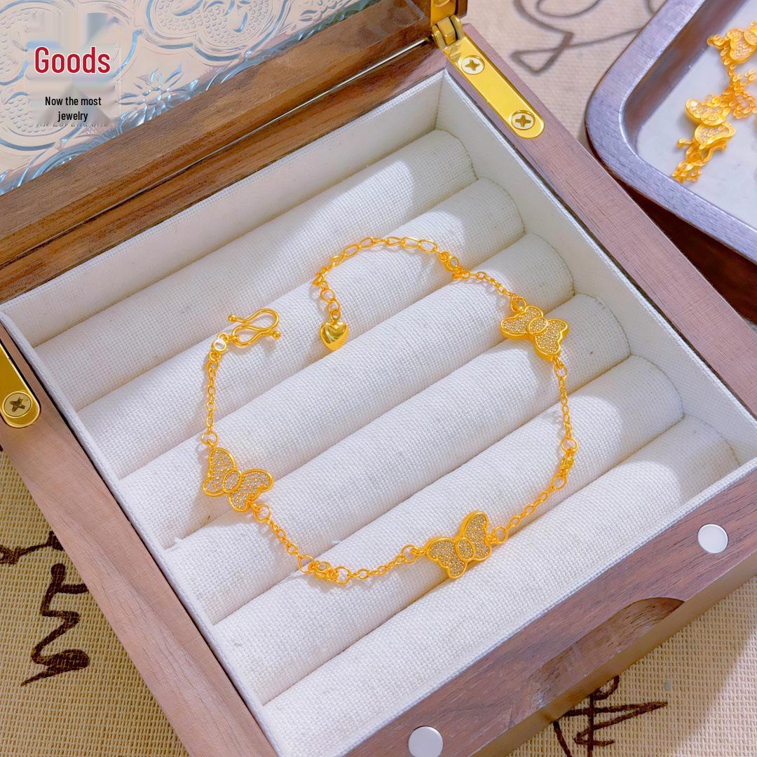 Золотой браслет с искусственным жемчугом, четырехлистником и цветами