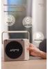 Bluetooth Wireless Speaker with Light-Activation, High-Quality Sound, Smart Design, Night Light Feature, and Compact Size.