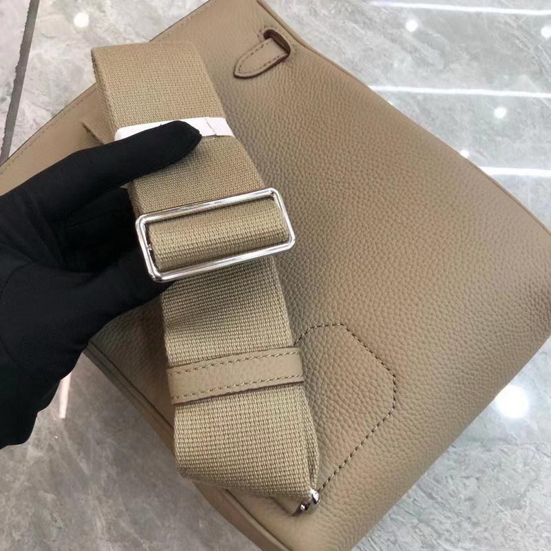 2025 New Leather Gender-neutral Men's and Women's Same First-layer Cowhide Round Lock Hole Breast Bag Single Shoulder  Leather Backpack