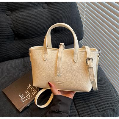 Retro Nischen-Textur-Tasche Damen Neue Vielseitige Mode-Handtasche Einzelne Schulter Crossbody Eimer-Tasche