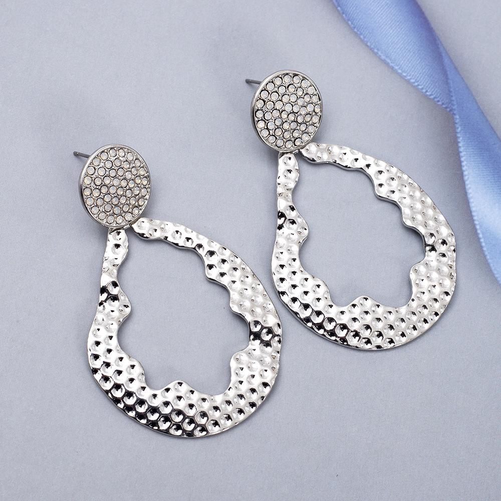 Minimalist Women's Geometric Teardrop Earrings with Irregular Hollow Design and Zinc Alloy Diamond Inlays
