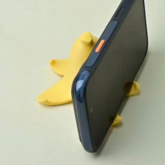 Cute Yellow Banana Peel Phone Holder 3D Printed Funny Banana Desktop Cell Phone Stand for All Mobile Phones