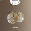 European and American round simple texture pendant ear hook Hong Kong style retro niche design earrings light luxury high-end earrings women