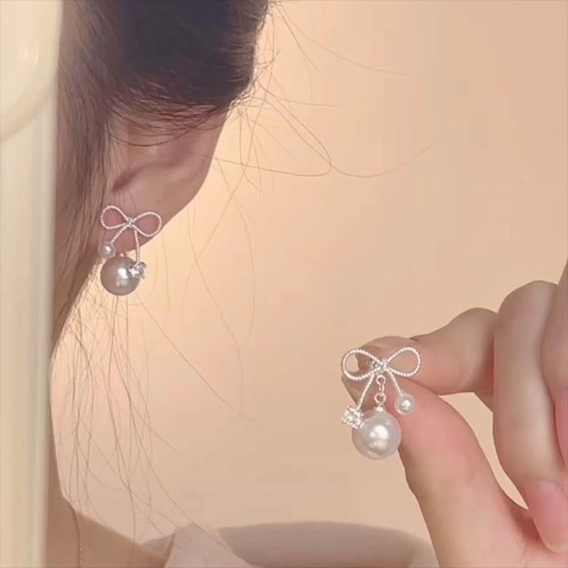 

925 Silver Stud Bow Pearl Zircon Stud Earrings Sweet Western Style Unique Niche Design High Class Elegant Earrings Silver Pearl bow 925 silver needle