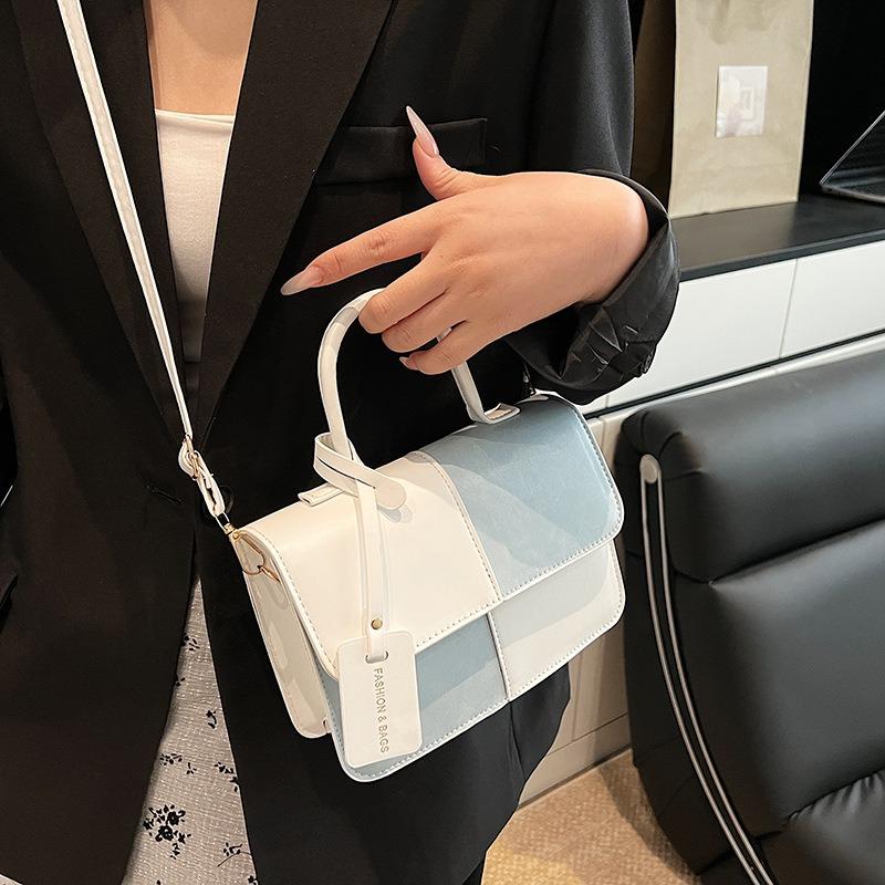 Spring fashion trend high-end sense light luxury shoulder messenger bag contrasting color design sense beautiful temperament handbag women's bag