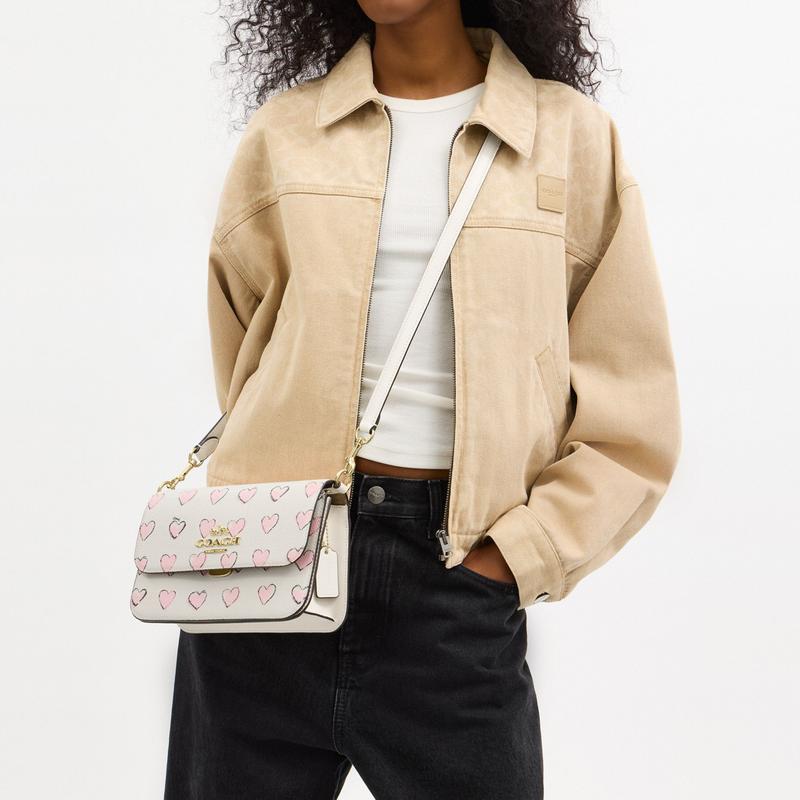 Coach [Qixi Festival Limited] Brynn 23 Love Print Metal Logo Cowhide Armpit Bag Crossbody Shoulder Bag Medium Women’s Chalk White