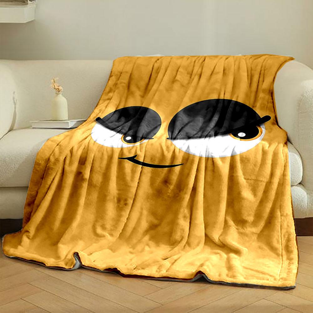 Minimalist cartoon face with large expressive eyes and a sly smile. for all seasons blanket lunch break throw gift