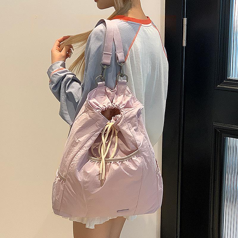 Niche design women's casual backpack college wind lightweight drawstring backpack