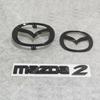 Pour MAZDA 2 Calandre de radiateur avant de voiture Emblème de remplacement Badge de coffre arrière Emblème de porte de voiture Autocollant d'emblème Accessoires de voiture