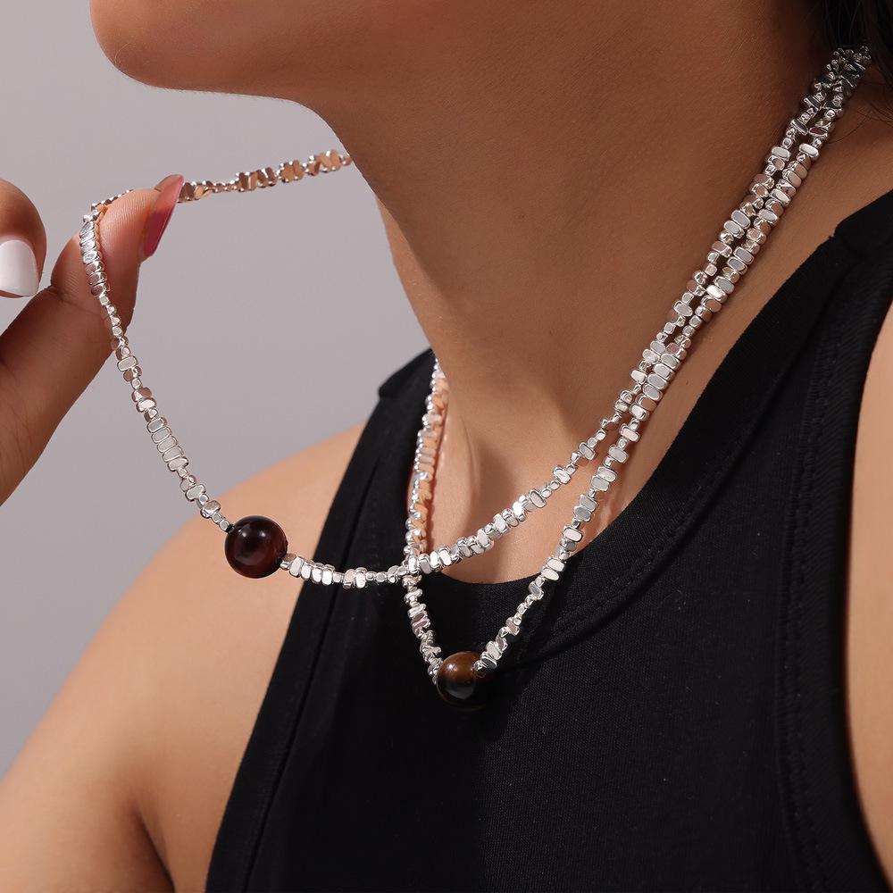 Minimalistyczny koreański naszyjnik z zawieszką z tygrysiego oka z łączonym srebrem próby 925 i designem ze stali tytanowej