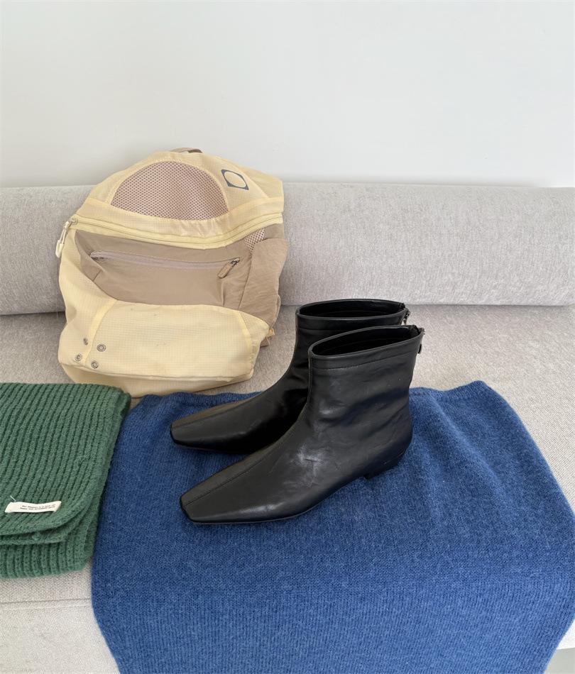 Korean version of the new flat-bottomed short Chelsea boots, small square pointed head, low heel, inner height-increasing soft leather bare boots, a