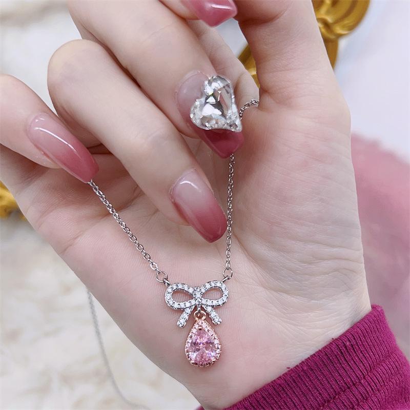 Pink Zirconia Bow Pendant Necklace: Versatile & Fashionable Women's Jewelry