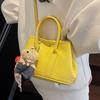 New Niche Simple Leisure Commuter Portable Bucket Bag Versatile Design Sense Solid Color Messenger Bag Women