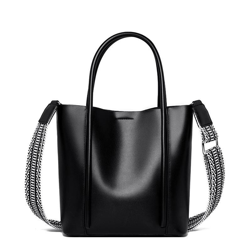 

Женские сумки из натуральной кожи — это простые и вместительные сумки-тоут, сумки для матери и ребенка, а также двухслойные сумки из коровьей кожи. чёрный