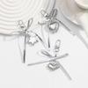 Heart Embellished Silver Leather Bowknot Key Rings Unique Accessory for Backpacks and Purses for the Modern Woman