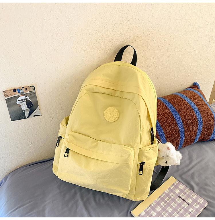 School bag Japanese simple solid color backpack light commuting large capacity student school bag casual versatile outdoor travel backpack