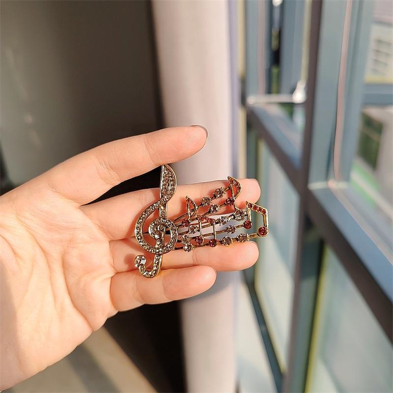 

Брошь Высококачественная Нишевая Корсажная брошь Высококачественная Универсальная Музыкальная Нота Стразы Одежда Сплавная Булавка Креативные Аксессуары