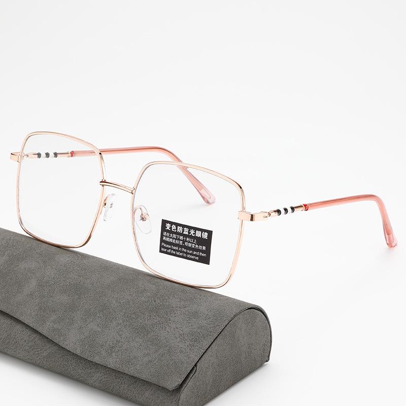 Occhiali da donna retrò quadrati fotocromatici anti-luce blu, montature color oro rosa che cambiano colore