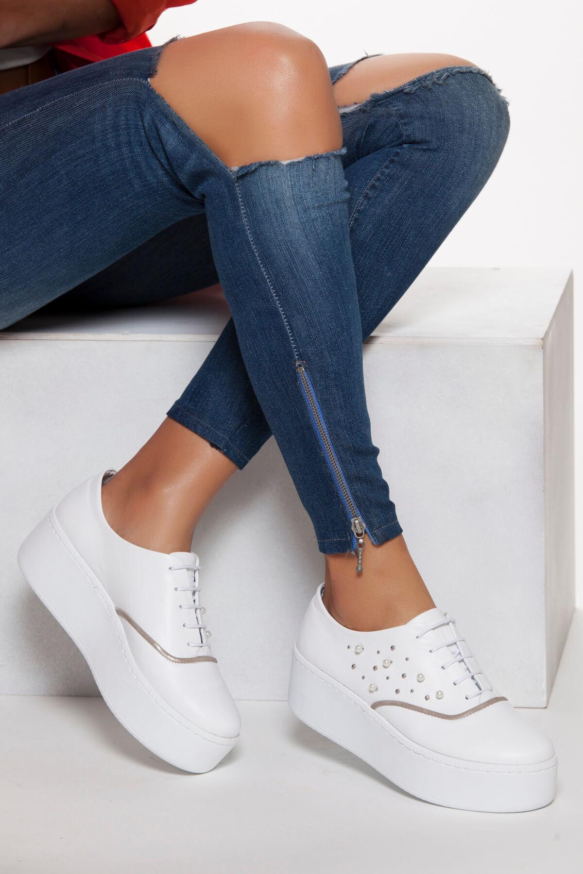 

Белые женские кроссовки из натуральной кожи 36