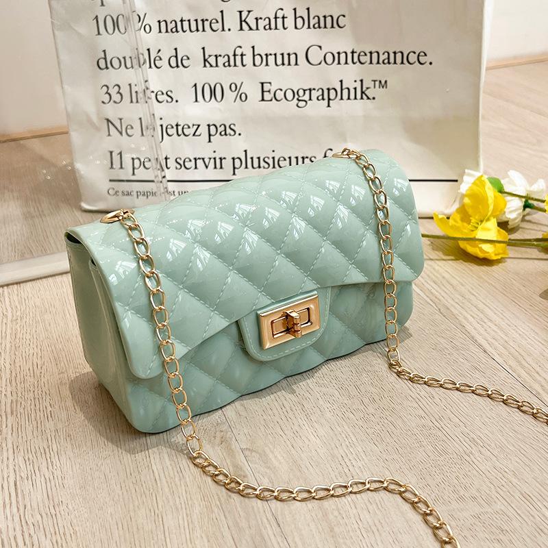 Fashion pearl shoulder jelly bag, women's versatile diamond lipstick change bag, one piece.