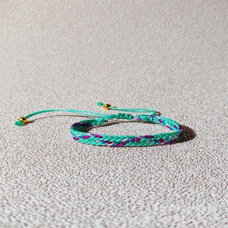 Handgefertigtes künstlerisches verstellbares Armband im nationalen Stil, gewebt