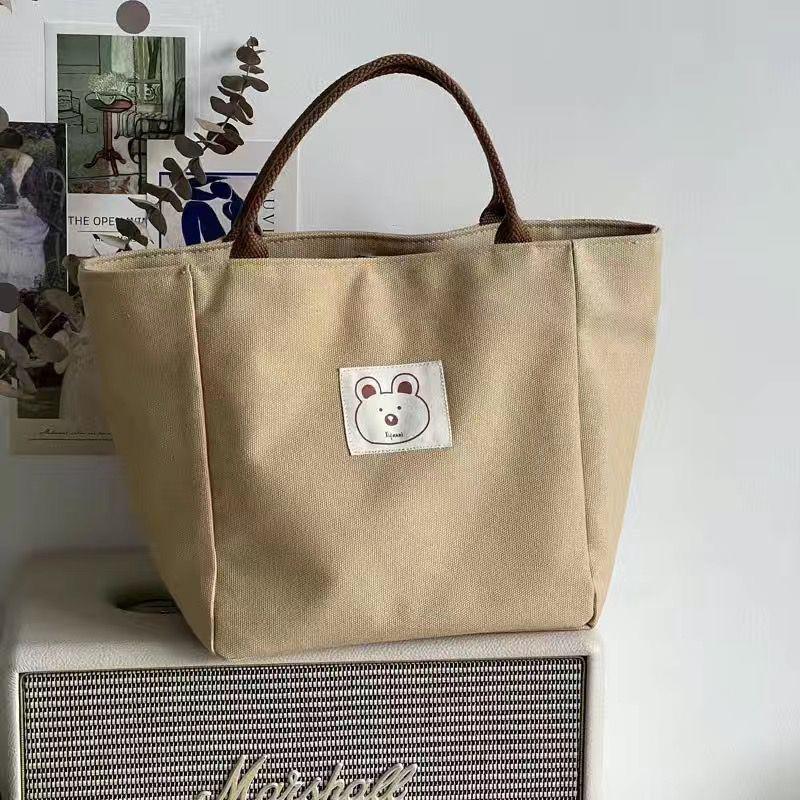 Women'S Japanese Canvas Handheld Cartoon Bear Patch Pattern Zipper Closure Large Capacity Simple Full Set Lunch Bag