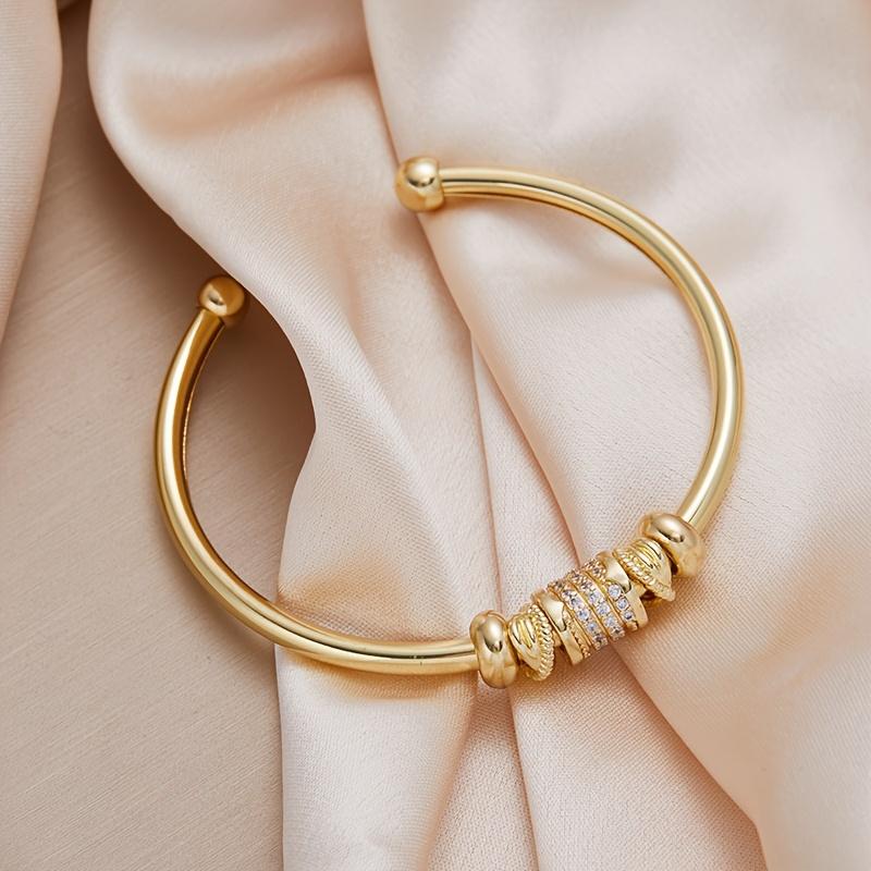 

Регулируемый браслет-манжета для женщин золотистый