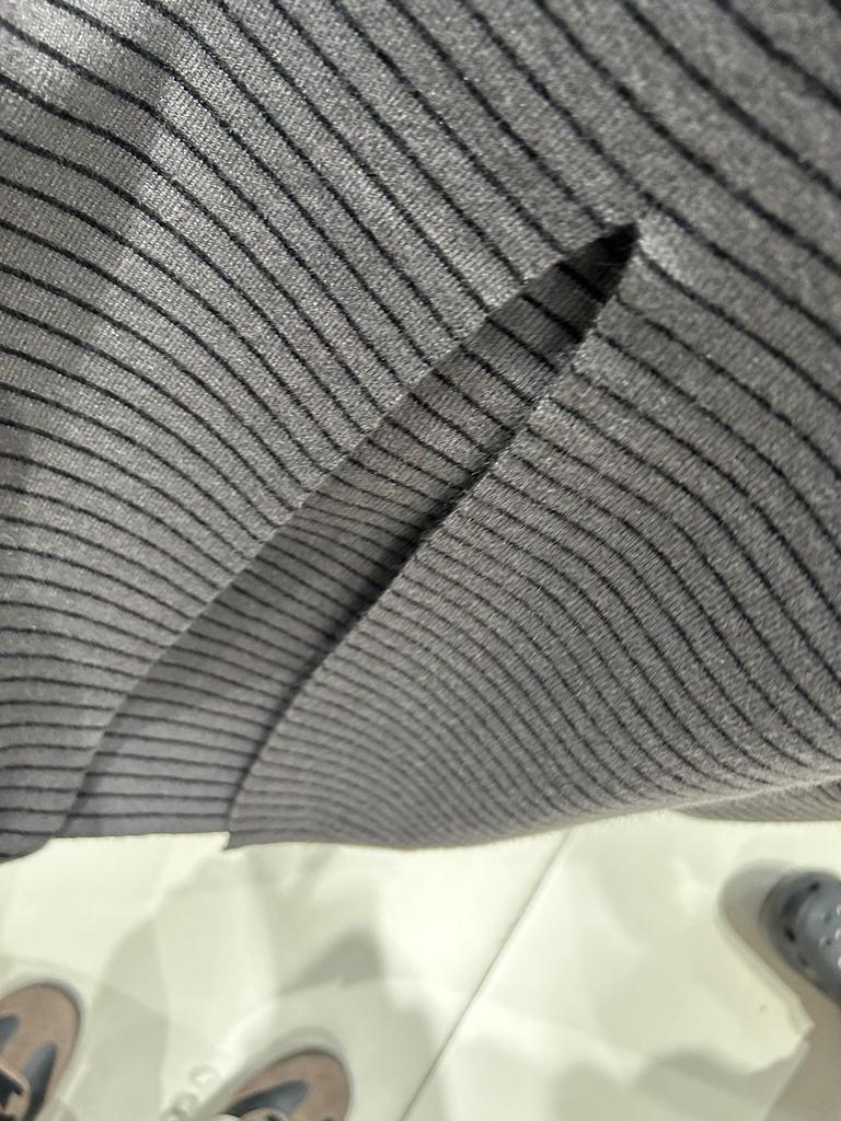 Women's Striped Knit Midi Skirt: High-Waisted, Elastic, Slimming, Back Slit, Perfect for Autumn and Winter.