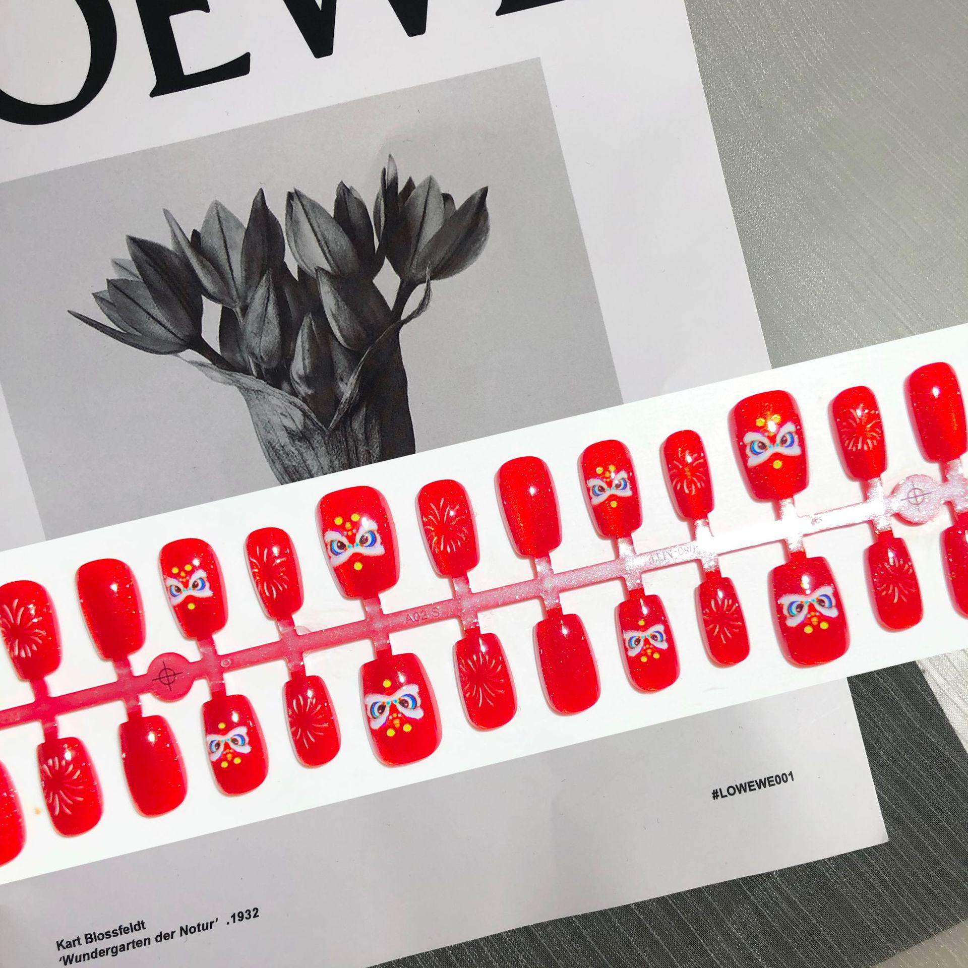 

Auspicious Red Cat Eye Fireworks Nail Art for Chinese New Year