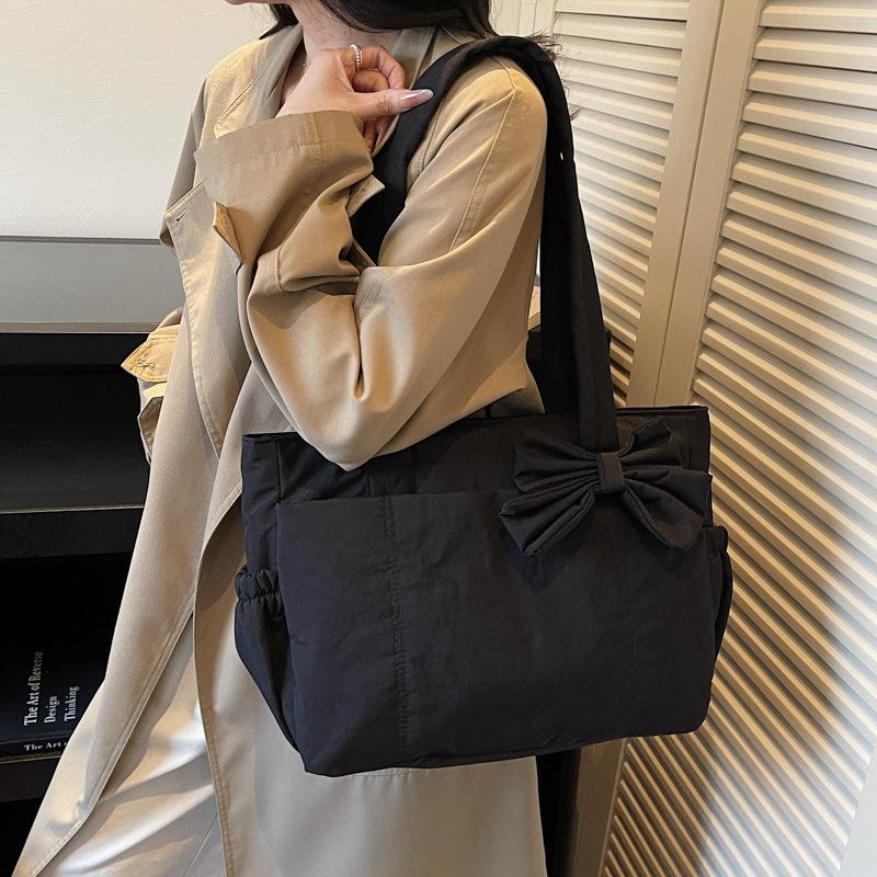 Bow tote bag for women, daily class commuting, versatile sweet girls simple and light handbag shoulder bag coffee color