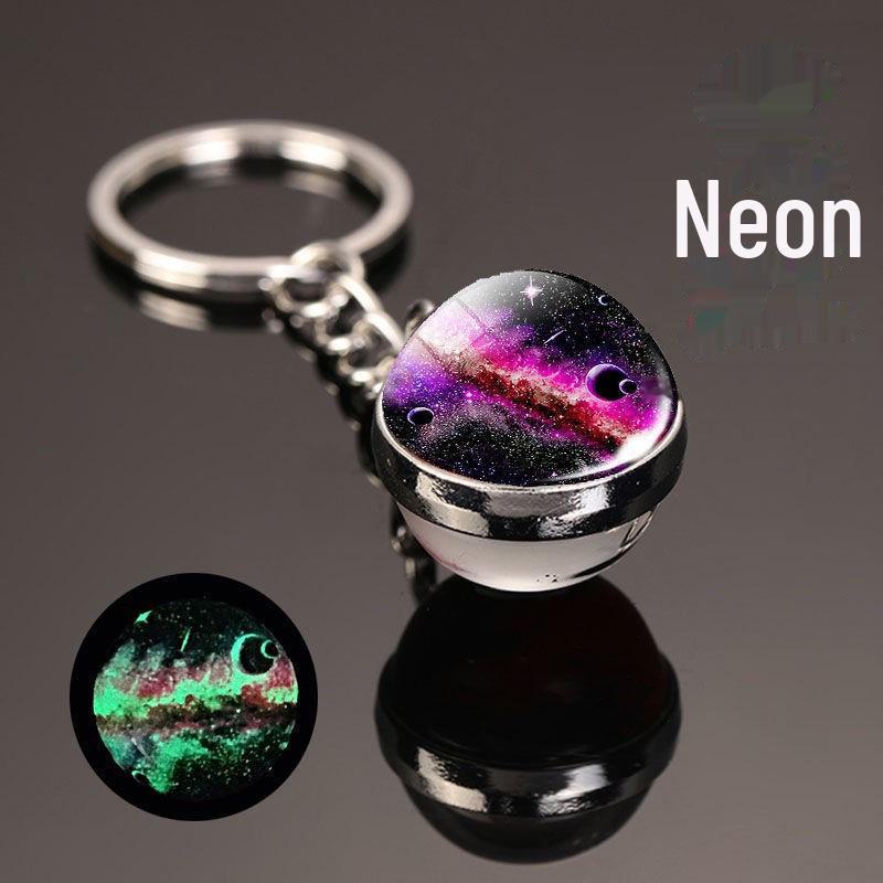 Oboustranná křišťálová galaktická klíčenka s designem planet a měsíce
