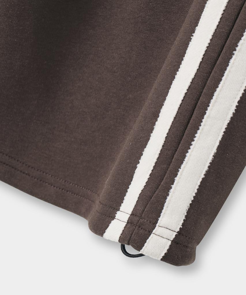 Dimiteulibeullaeg Vlad One-Pleat Curved Track Sweatpants_Brown