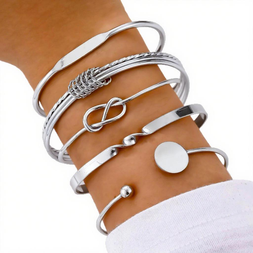 Elegante Vintage Hohllinien-Streifenblumen-Drehmetall-Armreif-Armband-Sets für Damen Tägliches Tragen Party Hochzeit Urlaub Schmuck
