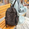 Leopard Print Backpack Casual Daily Use Trendy Street Style Lightweight Backpack for Women with Tassel Detail for School Travel and Everyday Outings