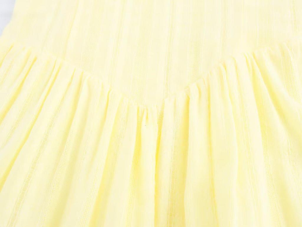 Rochie lungă texturată de primăvară 2025 pentru femei, stil european și american, cu bretele spaghete și fundă la piept.